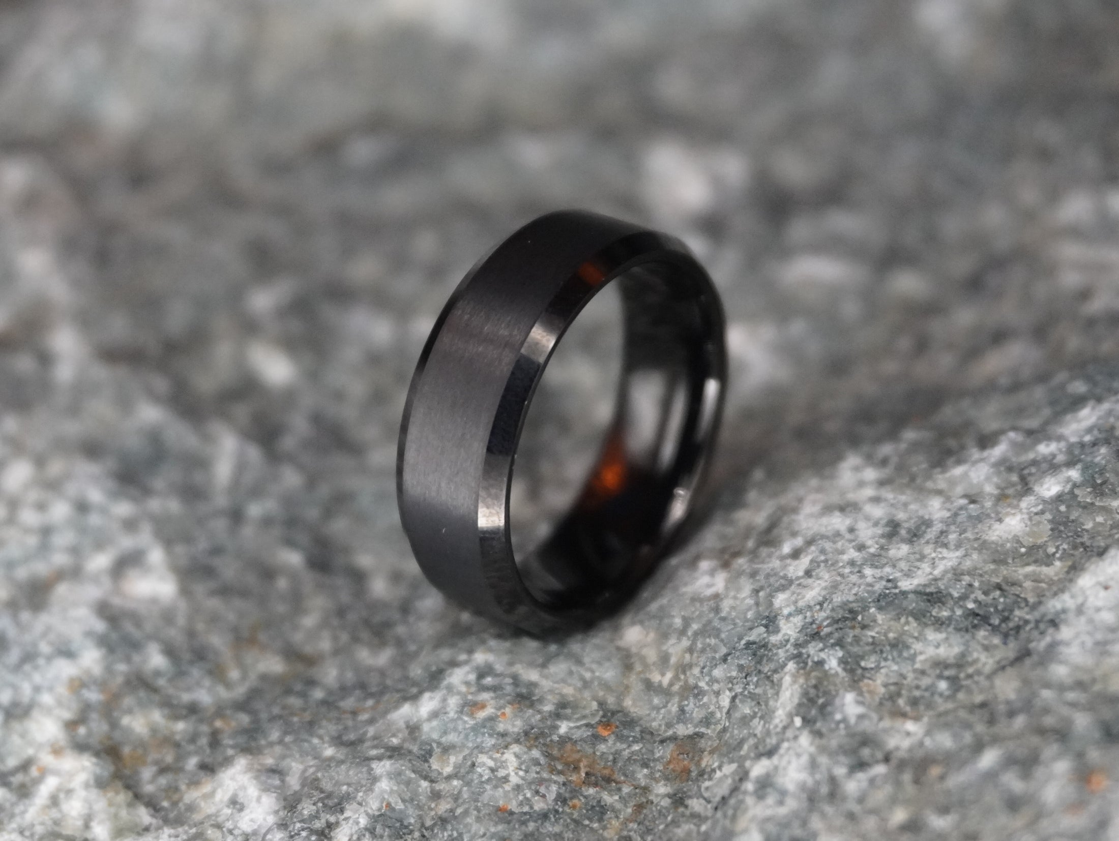 Bevelled Edge Wedding Ring and lumber