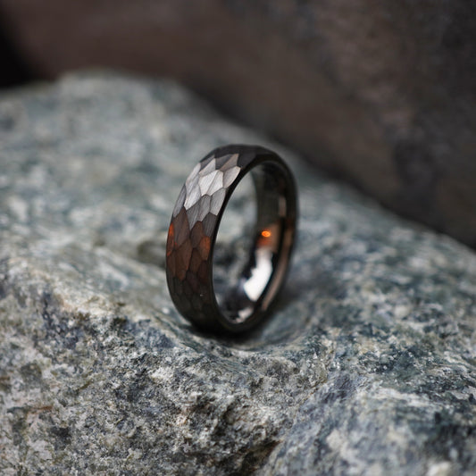 Black anvil-inspired ring with a textured finish, made by Forge and Lumber, available in sizes UK K to M.
