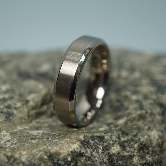 6mm aerospace-grade titanium ring from Forge and Lumber, available in multiple sizes, perfect for anniversaries.