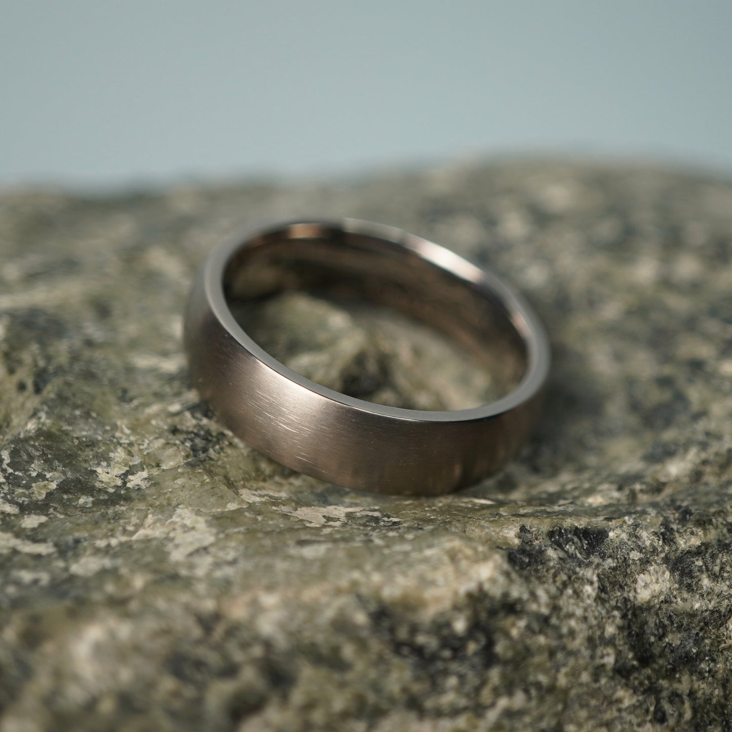 Titanium 6mm domed men's ring in silver from Forge and Lumber, available in sizes UK K to M.