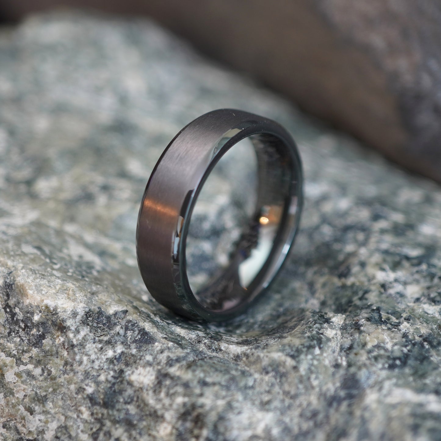 Beveled black zirconium ring, 6mm wide, by Forge and Lumber, available in UK K to M sizes.