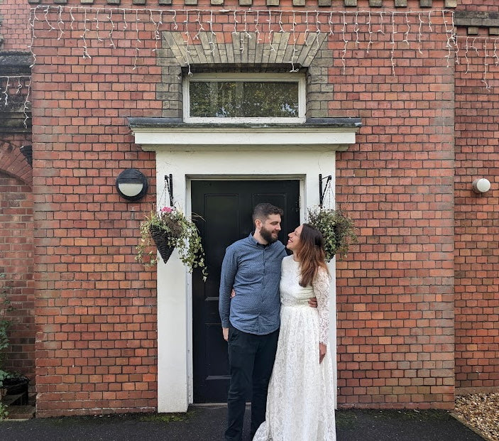 Image of Dan and Debby, owners of Forge & Lumber on their wedding day