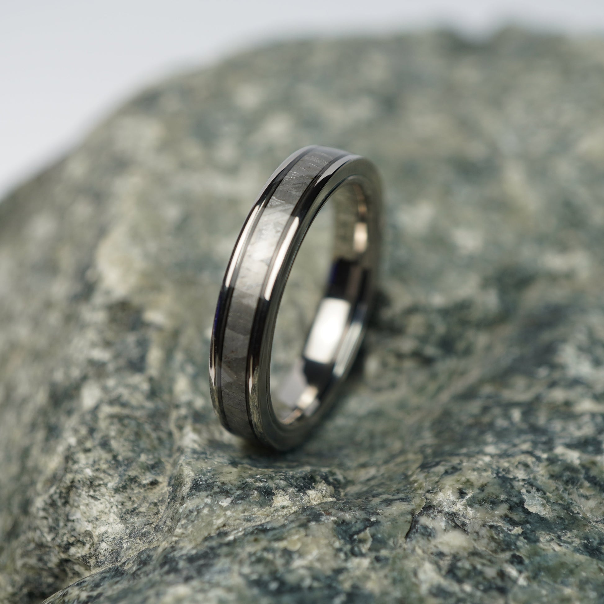 Aerospace-grade titanium 4mm wedding band with a brushed finish by Forge and Lumber.