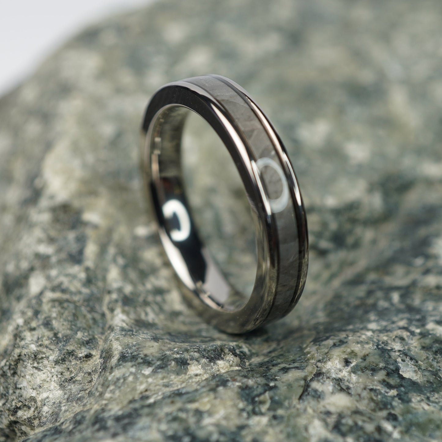 Aerospace-grade titanium 4mm alternative wedding band by Forge and Lumber with a sleek polished finish.