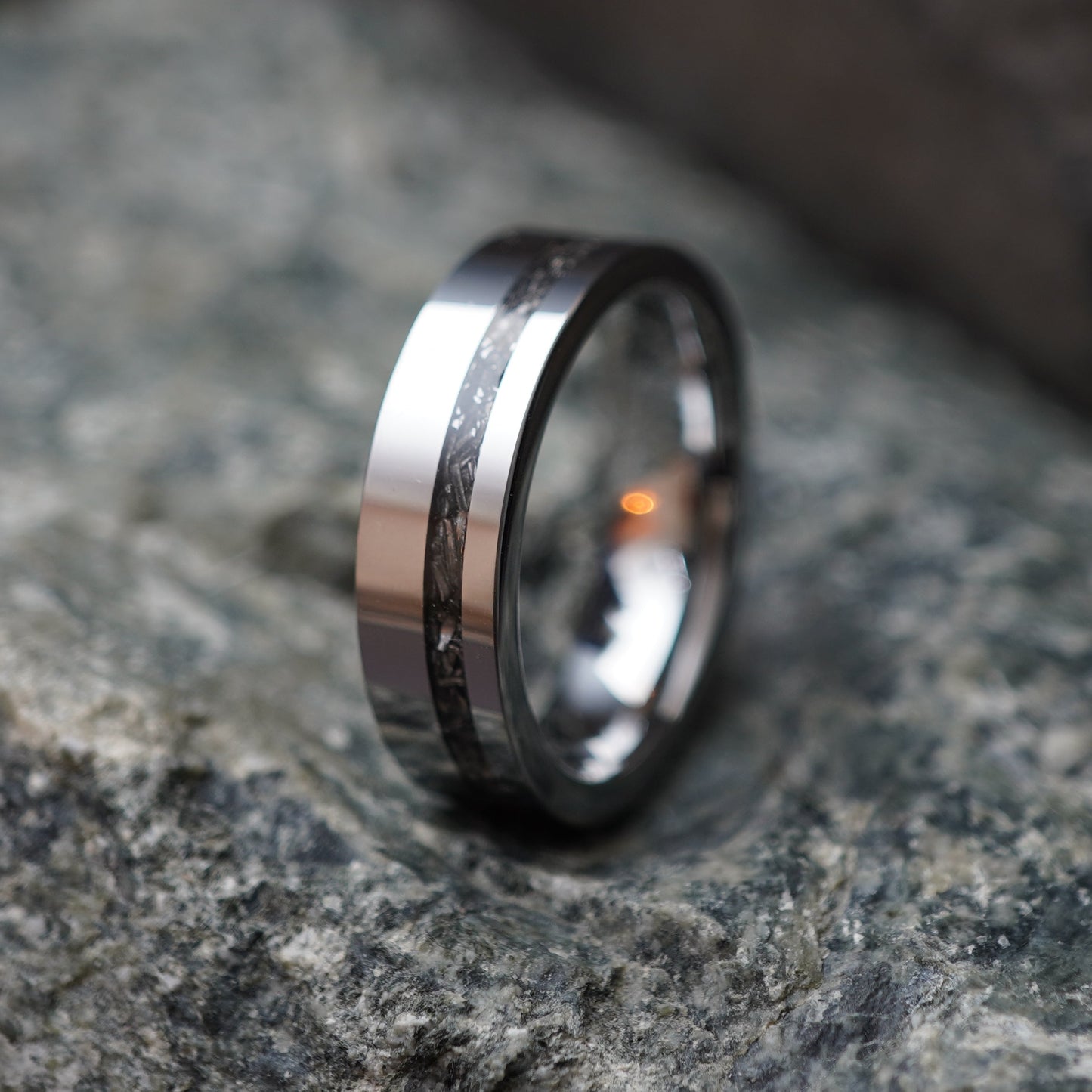 Men's 6mm stainless steel band ring with a textured black inlay by Forge and Lumber, ideal for anniversaries.