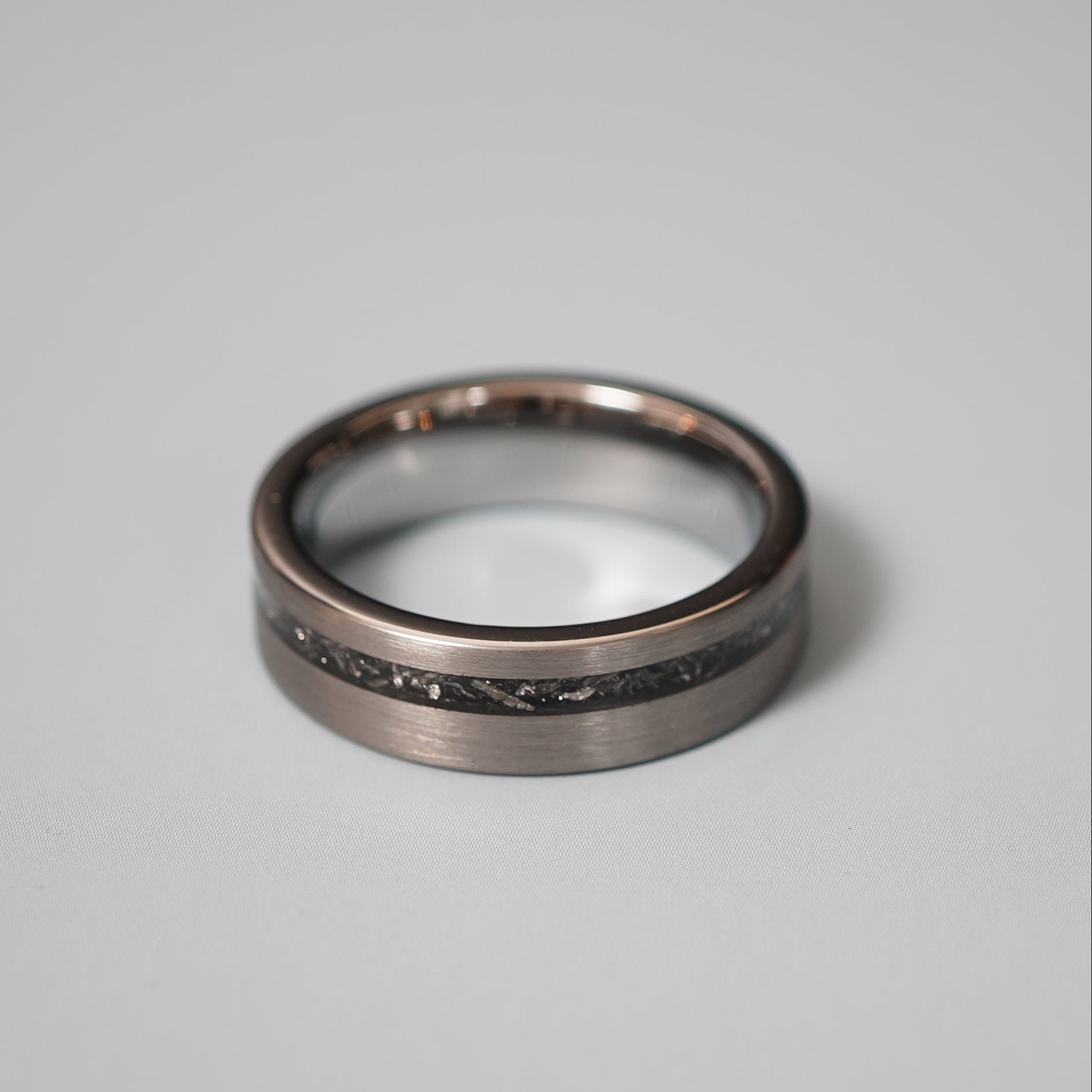 Engravable 6mm Nova ring by Forge and Lumber, featuring a sleek design with a cosmic inlay.