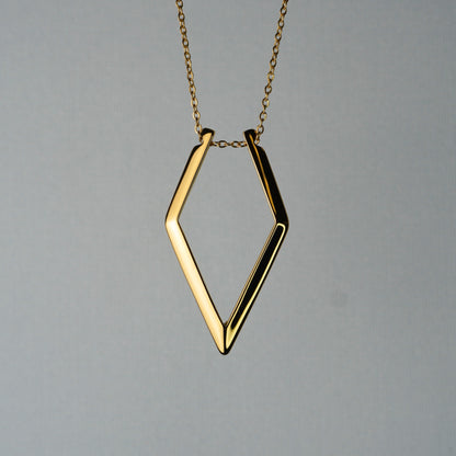 18K gold plated ring holder necklace with adjustable chain from Forge and Lumber, featuring tarnish-free design.