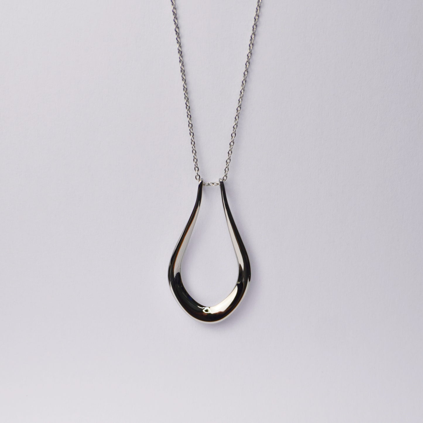 18k gold plated ring holder necklace by Forge and Lumber with adjustable chain, ideal for beach and active lifestyles.
