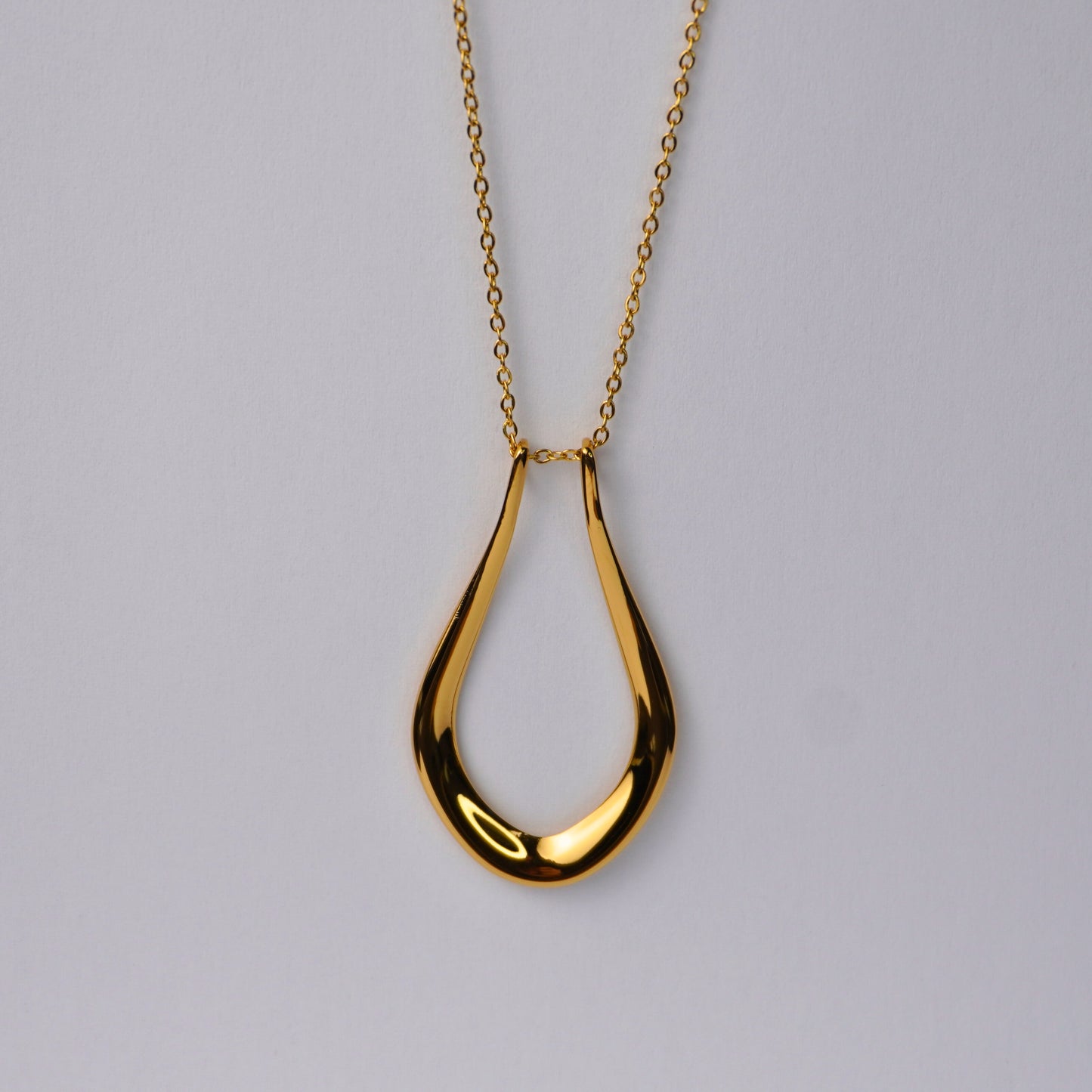 18k gold plated Abalone ring holder necklace from Forge and Lumber with adjustable chain and anti-tarnish finish