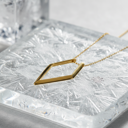 Forge and Lumber Ring Holder Necklace. 18k gold plated chain holds a ring.