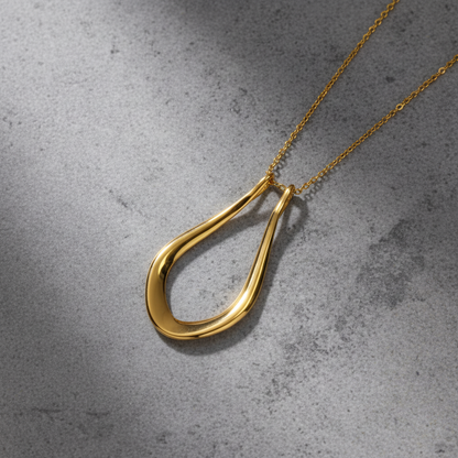 The Abalone pendant on its chain, shown close up