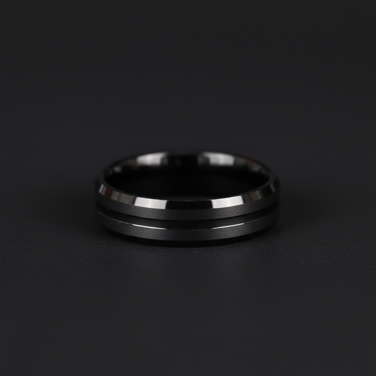 Sleek black ring with two polished silver stripes, showcasing modern design and elegance.